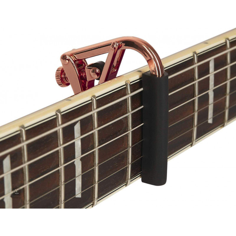 comprar Cejilla Capo Royale Guitarra Clásica SHUBB C2RG Oro Rosa, con mecanismo de rodillo y acción suave.