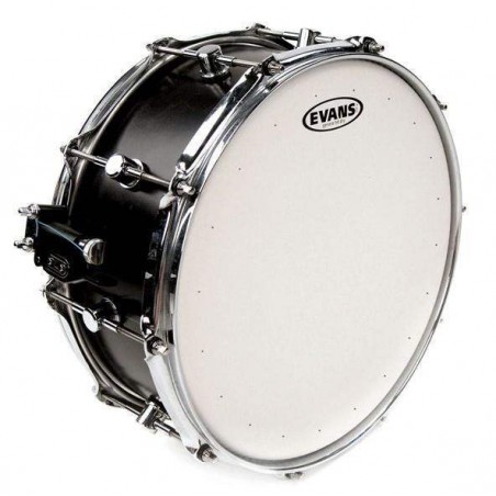 Parche batidor para caja de 12" Evans Genera Dry B12DRY de una capa de 10mil blanco rugoso con muffle y agujeros. Parche batidor para caja de 12" Evans Genera Dry B12DRY de una capa de 10mil blanco rugoso con muffle y agujeros.